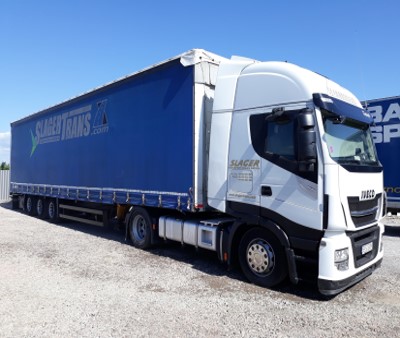 •	Transport cu semiremorci prelată