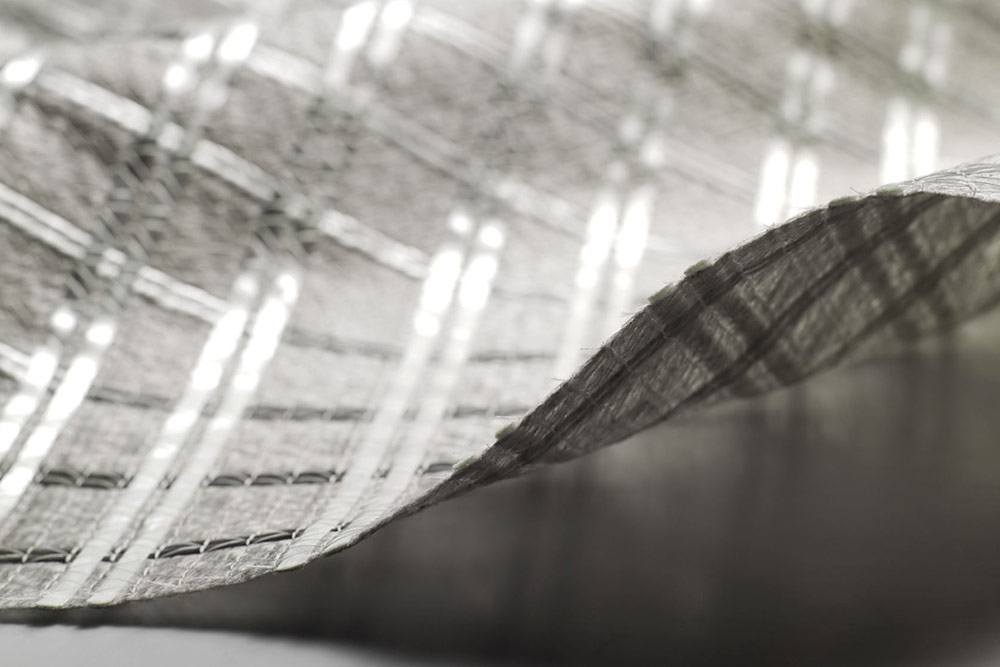 Materiale geocompozite antifisura